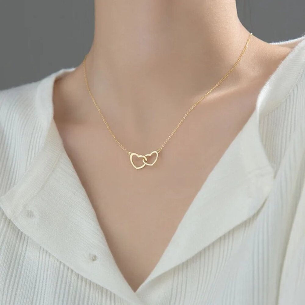 62. 18k Double heart necklace